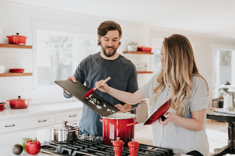 Family preparing groceries together in a bright kitchen